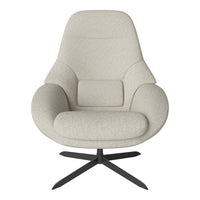 Light beige upholstered chair with a smooth, textured fabric and a sleek black metal base. Modern design.