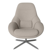 Light beige upholstered chair with a textured fabric and soft curves, complemented by a sleek metal base.