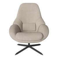 Beige upholstered chair with a smooth texture and subtle curved shape, featuring a sleek black metal base.