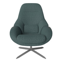 Teal upholstered chair with textured fabric and sleek metal base, featuring an ergonomic design. Ideal for modern decor.