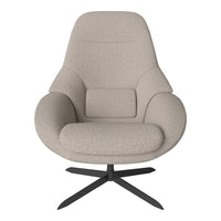 Beige textured armchair with a modern curved design and soft upholstery on a black metal base.