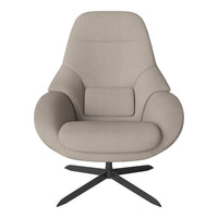 Beige upholstered chair with a smooth, minimalist design and a sleek black metal base. Perfect for modern interiors.
