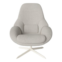 Light gray upholstered chair with a sleek design and smooth, modern curves on a white metal base.