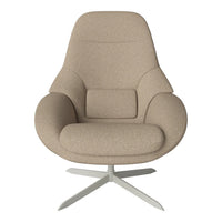 Beige upholstered chair with a smooth, minimalist design and a sleek silver base. Perfect for modern interiors.