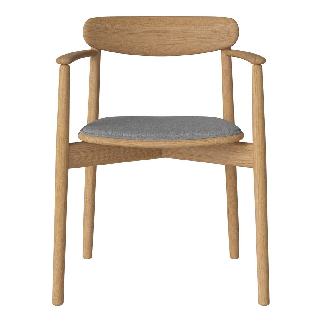 Natural wood armchair with a light gray cushioned seat and minimalist design.