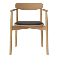 Natural wood chair with a light oak finish and a sleek black seat cushion, featuring simple, modern lines.