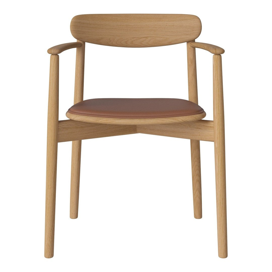 Natural wood chair with a light oak finish and a rich brown leather seat, featuring a minimalist design.