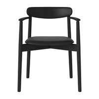Sleek black armchair with a minimalist design, featuring smooth lines and a matte finish. Perfect for modern decor.