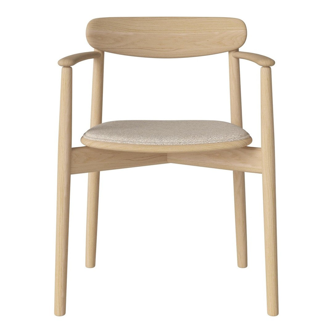Light wood chair with a beige patterned seat and natural finish, ideal for modern decor.