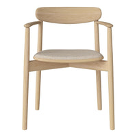 Light wood chair with a beige patterned seat and natural finish, ideal for modern decor.
