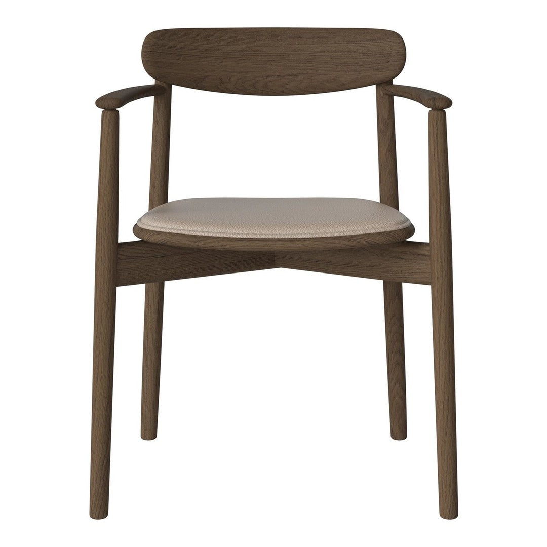 Light beige seat on a rich brown wooden chair with a minimalist design, showcasing smooth lines and natural textures.