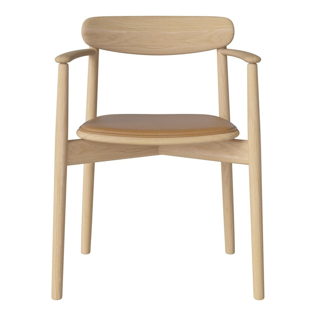 Light wood chair with a natural finish and a tan seat cushion, featuring a minimalist design and smooth curves.