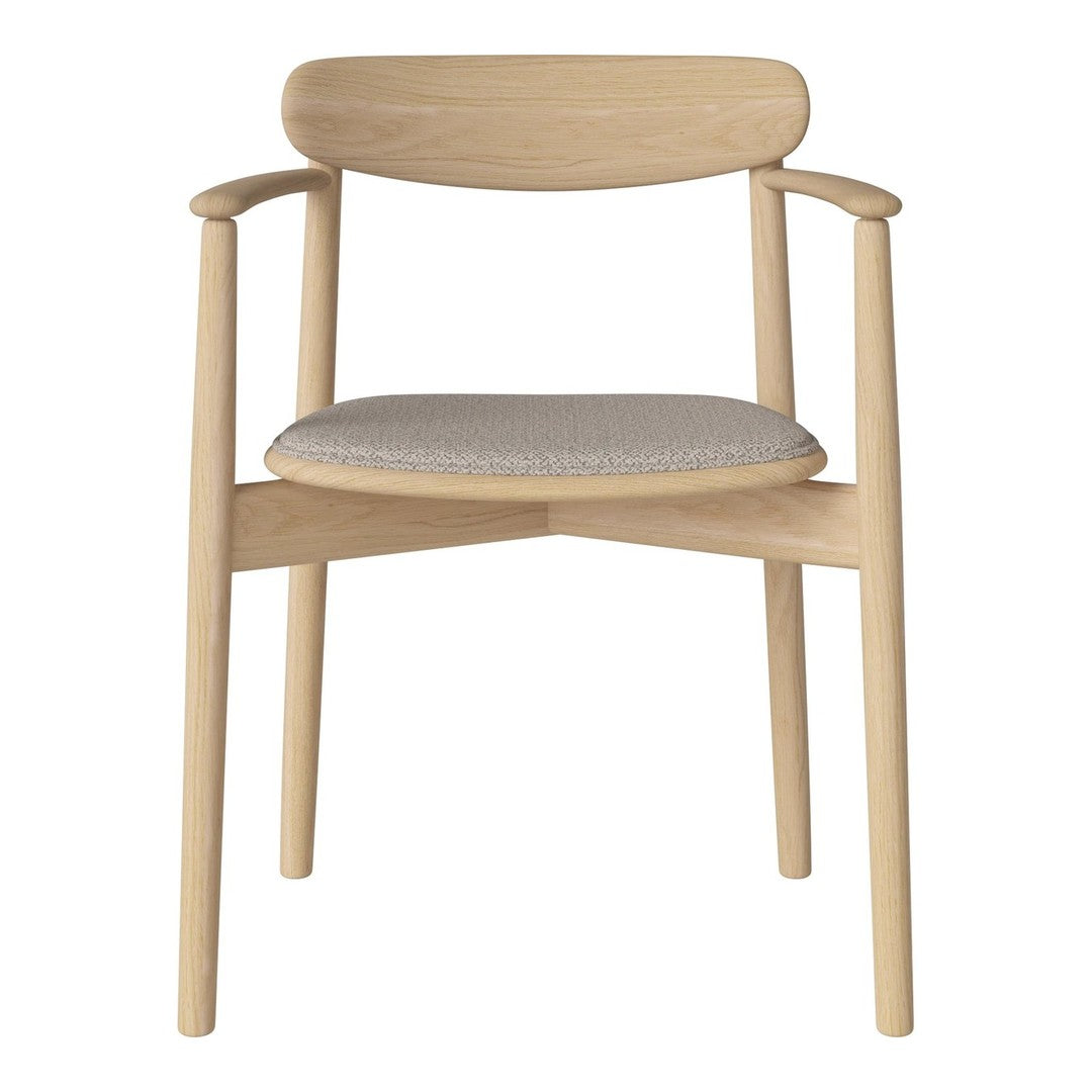 Natural wood armchair with a light gray patterned seat cushion, perfect for modern decor.