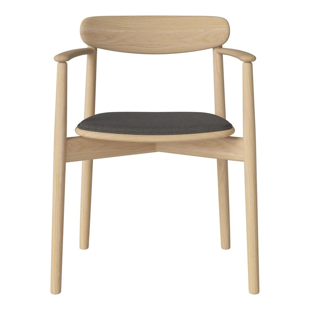 Light oak chair with a minimalist design, featuring a dark gray seat cushion and smooth rounded edges.