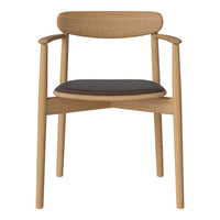Minimalist oak chair with a natural wood finish and a sleek black cushioned seat, perfect for modern decor.