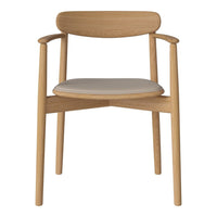Light oak wooden chair with a cream cushion seat and smooth, minimalist design. Perfect for modern decor.