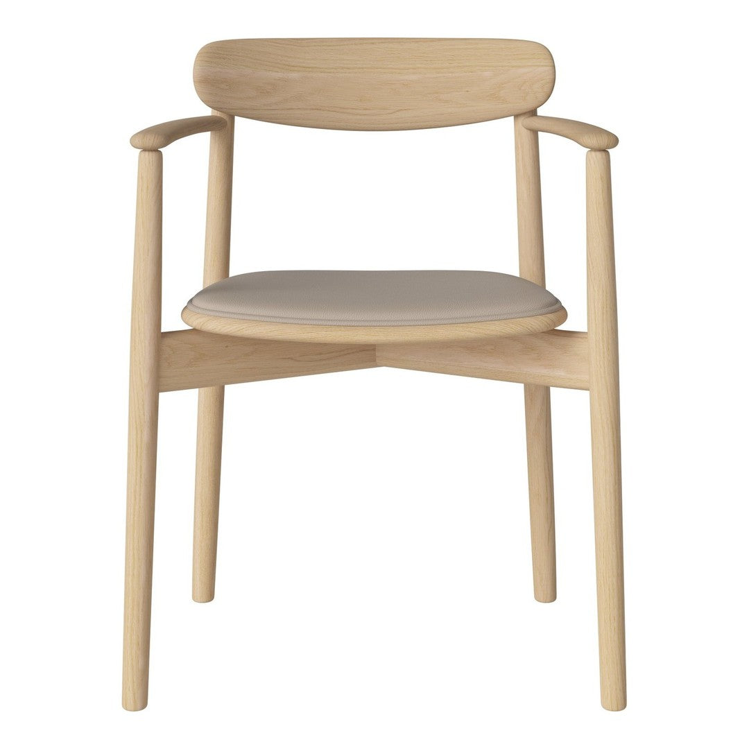 Light wood chair with a simple, natural finish and a smooth gray upholstered seat. Minimalist design and soft hues.