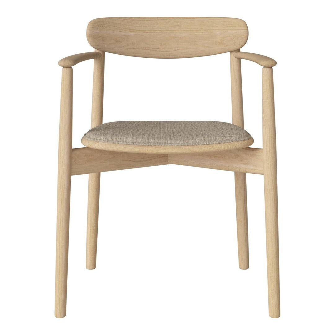 Light wood chair with a natural finish and a neutral beige seat cushion. Simple, modern design with clean lines.