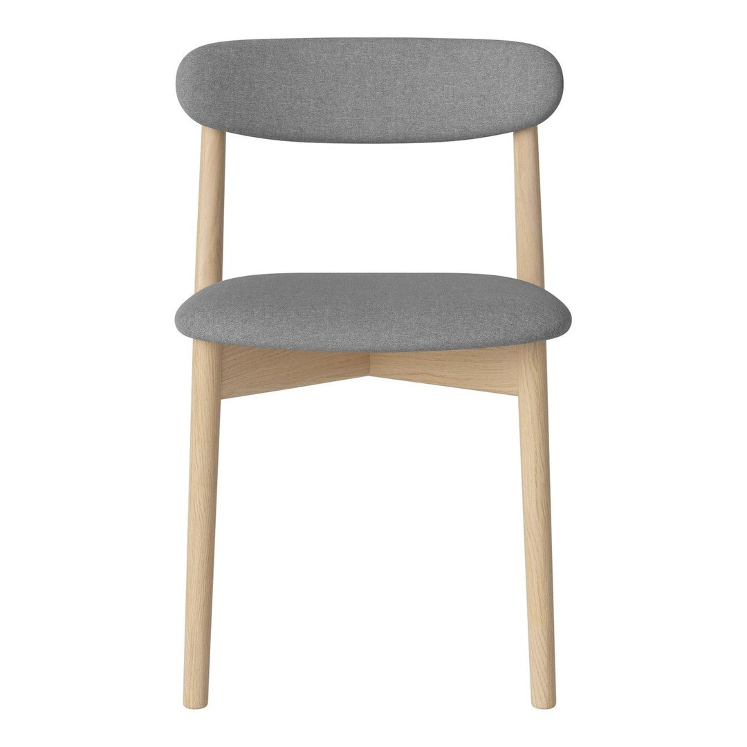 Gray upholstered chair with natural wooden legs and a minimalist design.