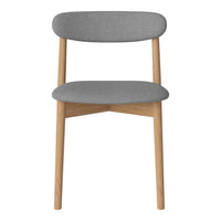 Gray upholstered chair with a minimalist design and natural wood legs. Simple, modern aesthetic perfect for any space.