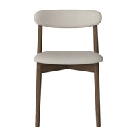 Light beige fabric upholstery on a minimalist wooden chair with a natural finish, featuring clean, simple lines.