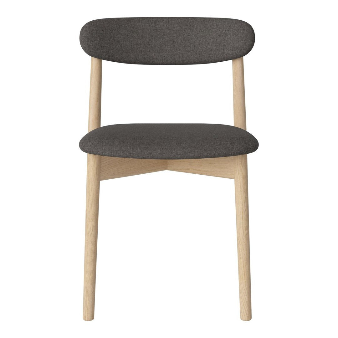 Gray upholstered chair with a smooth, minimalist design and natural wood legs, perfect for modern decor.