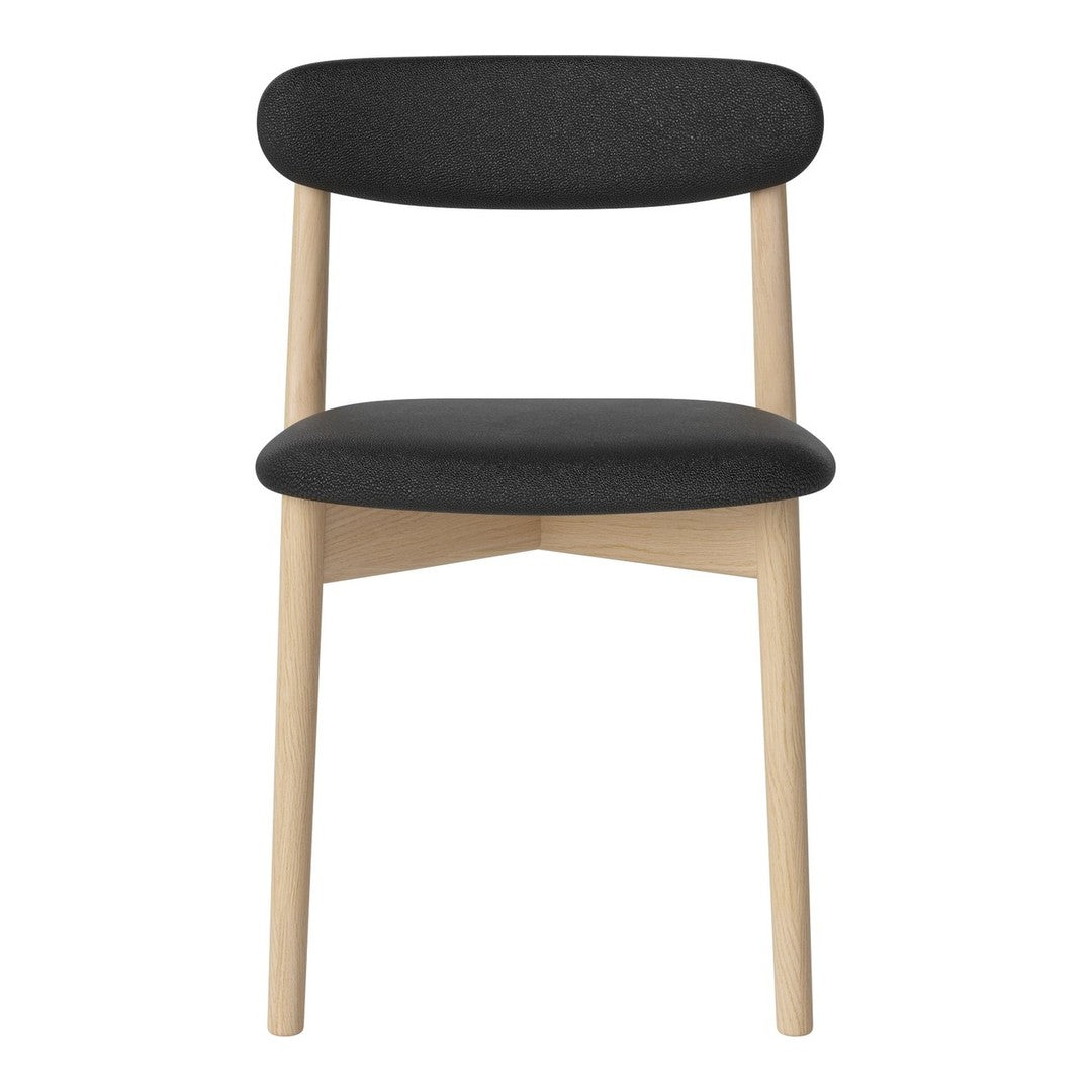 Black upholstered chair with a smooth, minimalist design and natural wood legs. Modern and stylish for any space.
