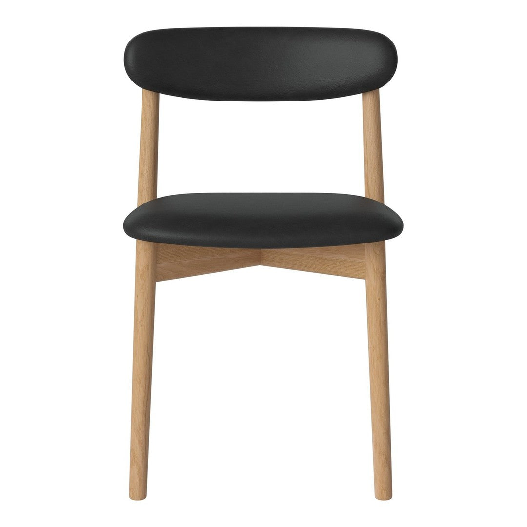 Black upholstered chair with a minimalist design and natural wood legs. Simple, modern color palette.