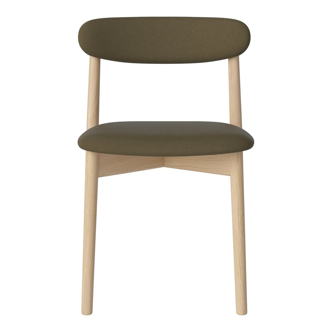 Green upholstered chair with a minimalist design and light wood legs, featuring smooth, solid colors with no patterns.