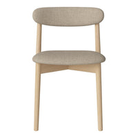 Beige upholstered chair with a smooth texture and natural wood legs in a minimalist design.