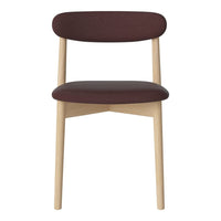 Burgundy upholstered chair with natural wood legs, featuring a minimalist design and smooth lines.