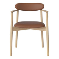 Light wooden chair with a smooth, tan leather seat and backrest, featuring a minimalist design.