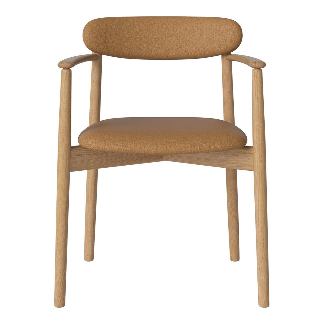 Tan leather chair with smooth, rounded seat and backrest, supported by natural wood legs; minimalistic design.