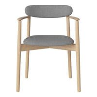 Minimalist grey upholstered chair with natural wood accents and a clean, modern design. Perfect for any decor.