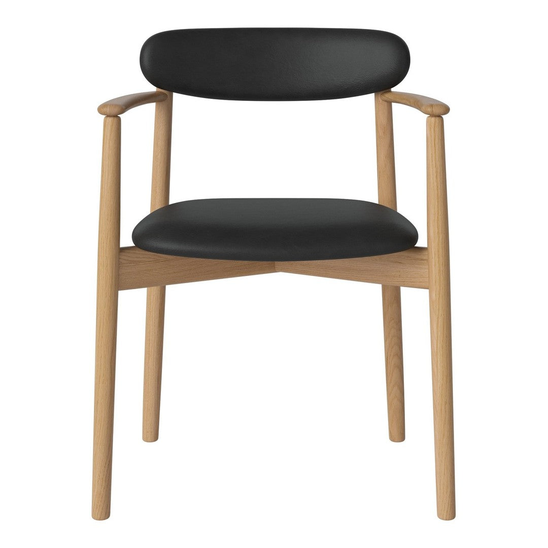 Black leather chair with natural wood frame and smooth, minimalist design. Perfect for modern interiors.