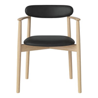 Black padded seat and backrest with natural wood arms and legs, featuring a minimalist design.