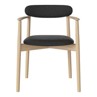 Black upholstered chair with natural wood frame, featuring a sleek, modern design and minimalist style.