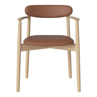 Light wooden chair with a smooth, rounded brown leather seat and backrest, featuring minimalist design.