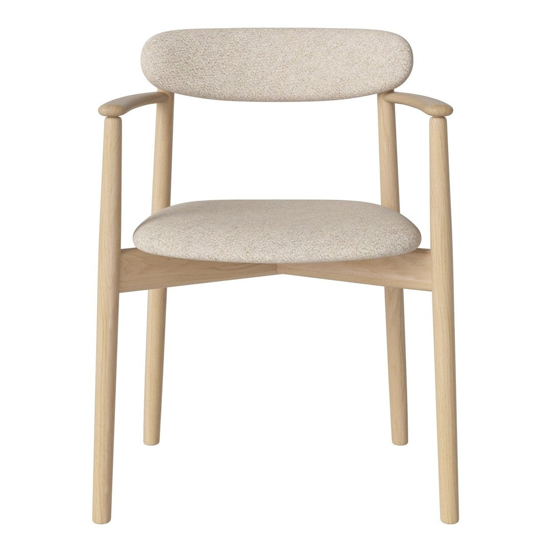 Beige upholstered chair with a light wood frame, featuring a minimalist and modern design.