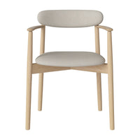 Light beige upholstered chair with a natural wood frame and minimalist design, perfect for modern interiors.