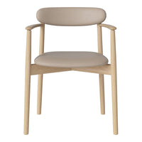 Beige upholstered chair with smooth, rounded backrest and natural wood legs in a minimalist design.