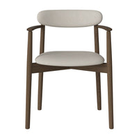 Beige upholstered chair with a minimalist design and dark wood frame, showcasing a modern, neutral color palette.