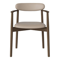 Beige upholstered chair with a smooth finish and wooden frame, featuring minimalist design for a modern look.