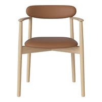 Tan leather seat with a light wood frame, showcasing a minimalist design and smooth, clean lines.