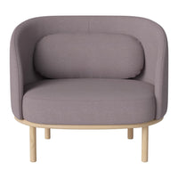 Curved lavender sofa with a minimalist design and light wooden legs. Perfect for modern living spaces.