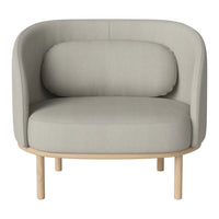 Gray upholstered armchair with a rounded design and wooden legs, featuring a smooth, minimalist finish.