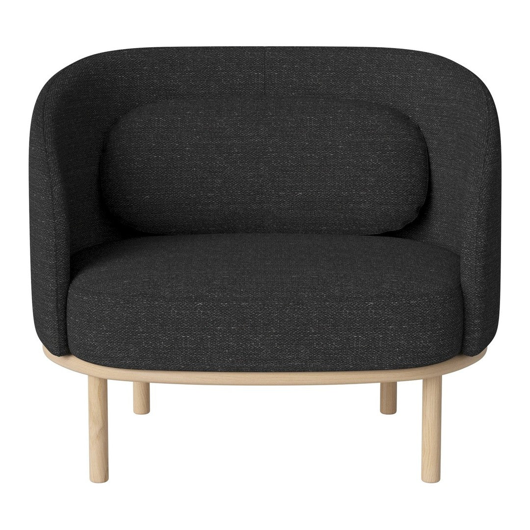 Gray upholstered armchair with a minimalist design, featuring a rounded shape and natural wood legs.