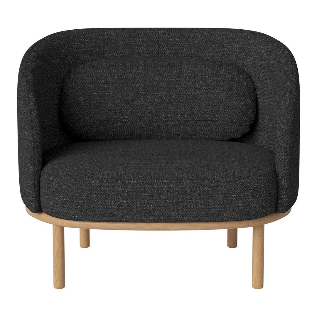Modern, curved armchair in dark gray fabric with a smooth wooden base, featuring a minimalist design.