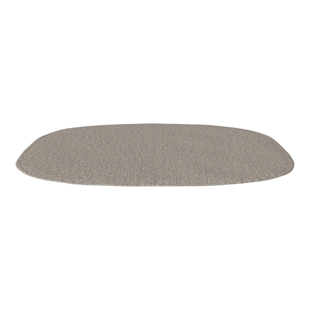 Neutral beige oval rug with a subtle textured pattern, perfect for complementing various interior styles.