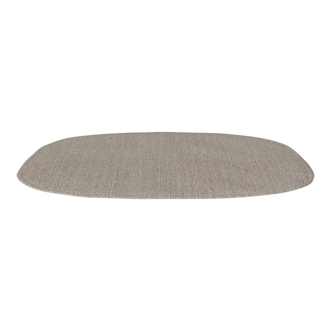 Textured oval rug in a soft taupe color with subtle woven pattern. Ideal for enhancing any living space decor.